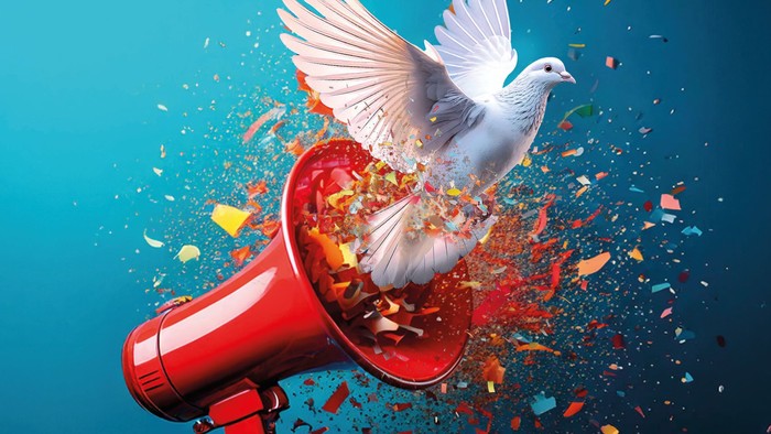 Lautsprecher und Taube: Motiv der Friedensdekade 2025.