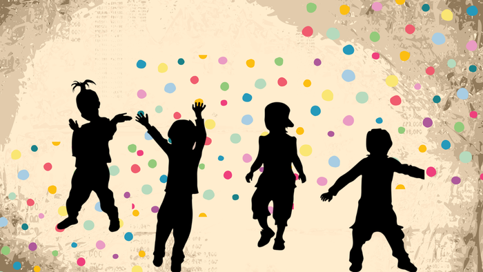 Vier Kinder tanzen freudig vor buntem Hintergrund