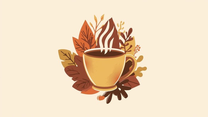 En varm kop kaffe omgivet af efterårsblade med damp, der stiger op, og som vækker hyggelige efterårsstemninger.