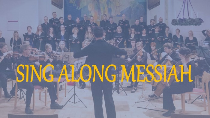 Et kor og orkester optræder sammen, dirigeret af en dirigent, med ordene **