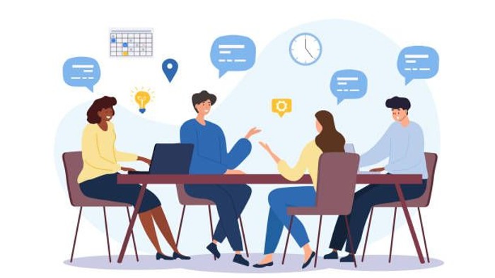 Vier Personen sitzen an einem Tisch und diskutieren, umgeben von Symbolen wie einem Kalender, einer Uhr und Sprechblasen.
