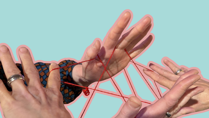 Hände mit einem Faden