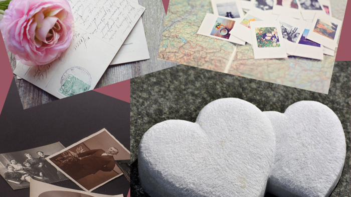 Das Bild zeigt verschiedene Erinnerungsstücke und Dekorationen, darunter Fotos, Karten und Herzformen