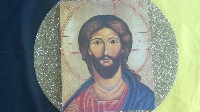 Das Bild zeigt eine Ikone von Jesus Christus mit Heiligenschein