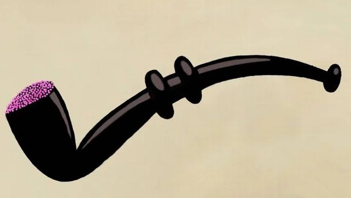 En sort pibe med rosa smukkesteiner.