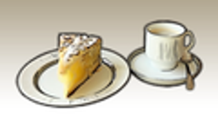 Ein Teller mit Kuchen, eine Tasse und eine Untertasse