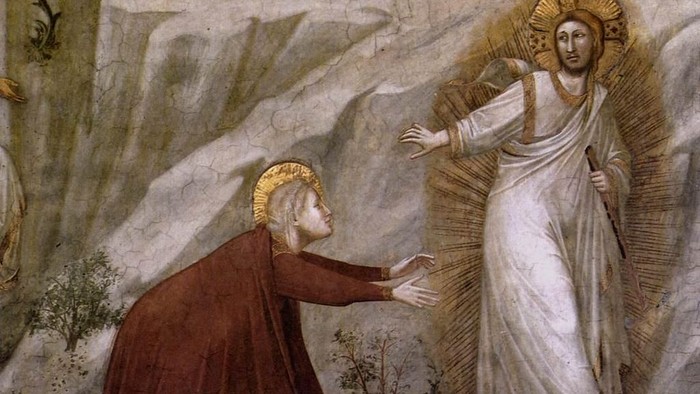 Et religiøst maleri viser en skikkelse, der knæler foran en strålende, helgenkranset figur.