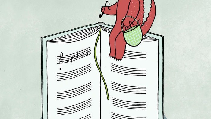 Ein Krokodil spielt Geige auf einem Notenbuch.