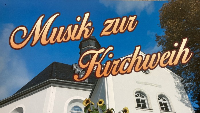 Bild zeigt Kirche mit Sonnenblumen und Himmel, Text 