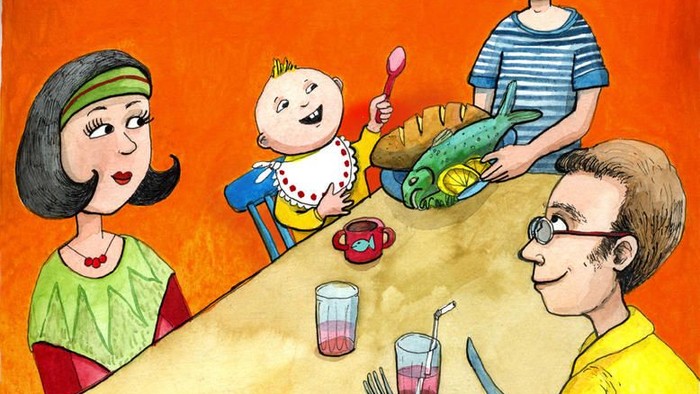 Eine Familie beim Essen: Mutter, Vater, zwei Kinder genießen gemeinsam eine Mahlzeit.