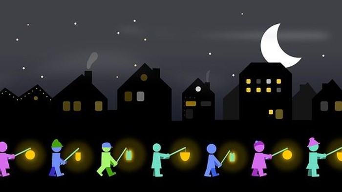 Kinder mit Laternen gehen nachts durch Stadt