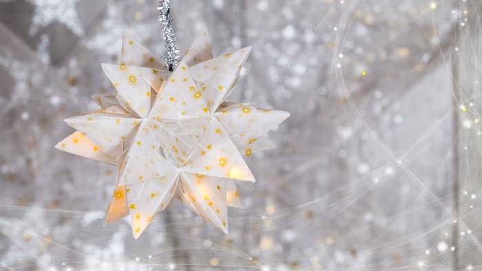 Flettet stjerne på baggrund af glimmer