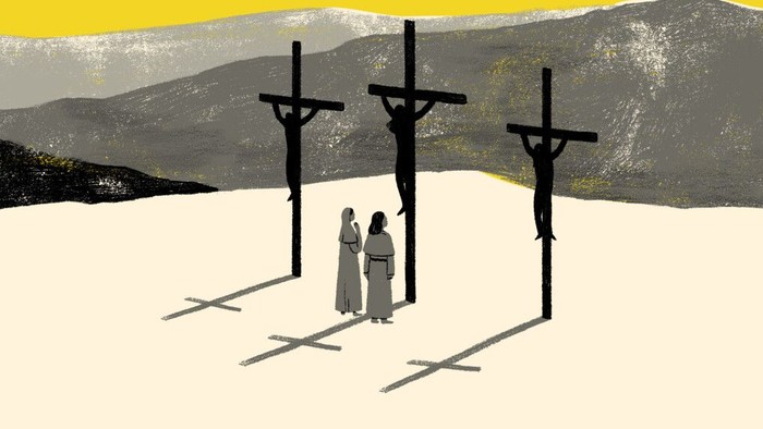 To silhuetter af sørgende står foran tre kors mod en ørkenbaggrund i skumringen.