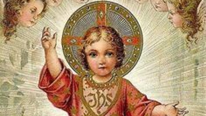 Et billede af en hellig barnetid med halo og engle.
