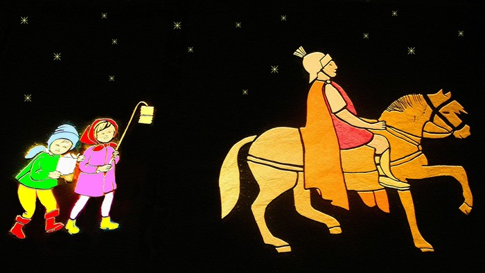 Drei Kinder und ein Reiter auf einem Pferd unter Sternen