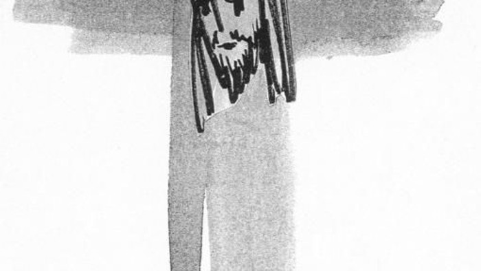 Ein Kreuz mit einem gezeichneten Gesicht in der Mitte.