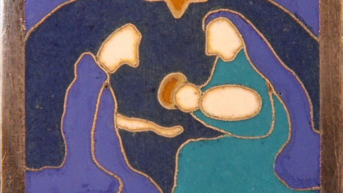 Billedet forestiller en nativity scene med moderen, barnet og stjernen.