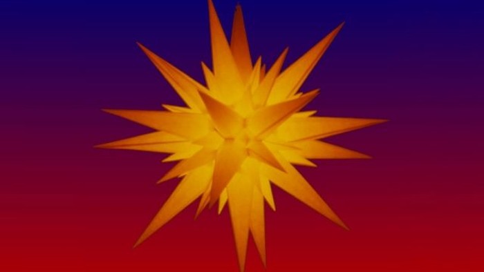 Ein leuchtend gelber Stern vor einem roten Hintergrund