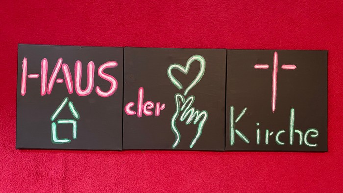 Das Neon-Schild zeigt 