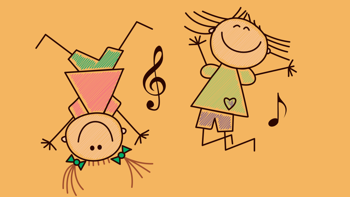 To børn danser og synger glade.