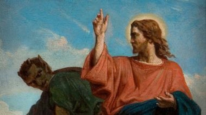 En maleri af Jesus med en gloriehale og en person i grønne klæder.