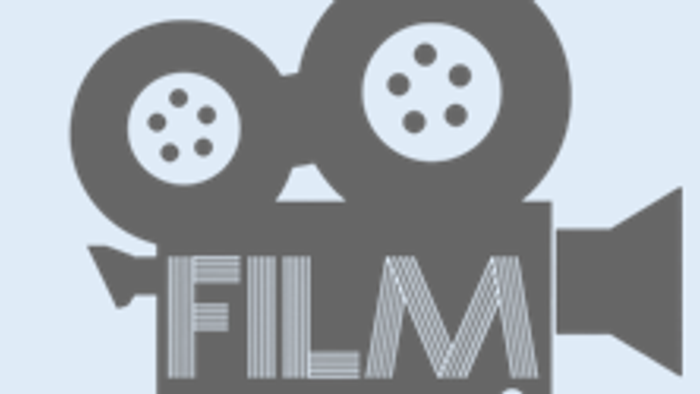 En filmkamera med spoler og ordet **