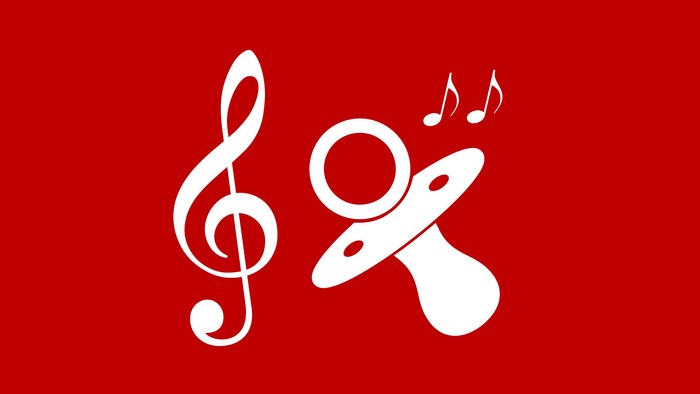 Billedet viser en notetabel og en sugeflaske på rød baggrund