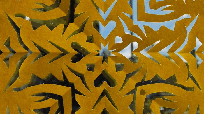 Papirklip med geometriske former og mønstre