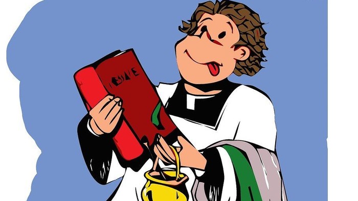 Ein Junge sitzt mit einem Buch und einer Tasse Tee.