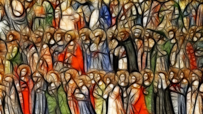 Ein farbenfrohes Glasfenster mit zahlreichen Heiligen und religiösen Figuren.