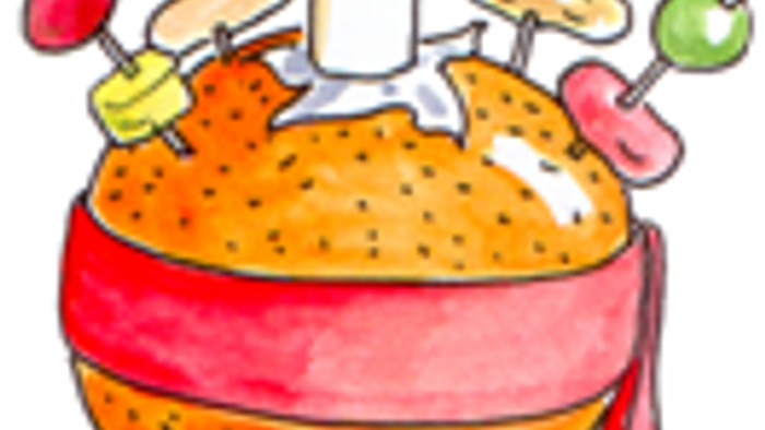 A lit candle in a decorated bowl with fruits and ribbons.