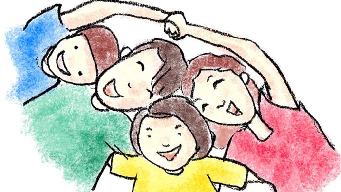 Vier fröhliche Kinder spielen zusammen unter einem bunten Regenschirm