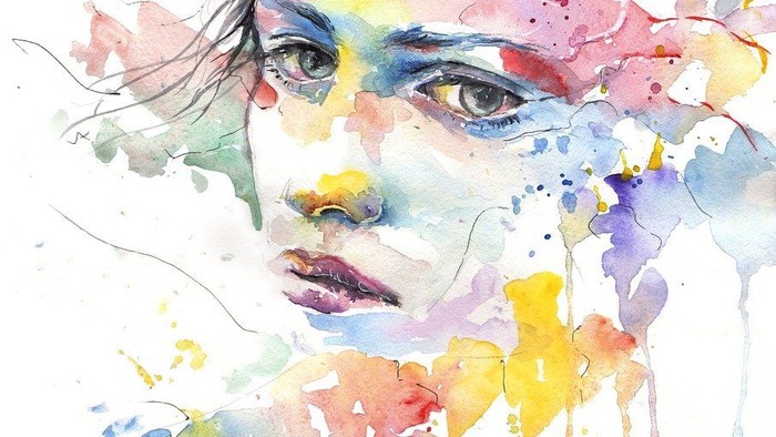 Ein farbenfrohes Wasserfarbbild eines Gesichts mit ausdrucksstarken Augen.