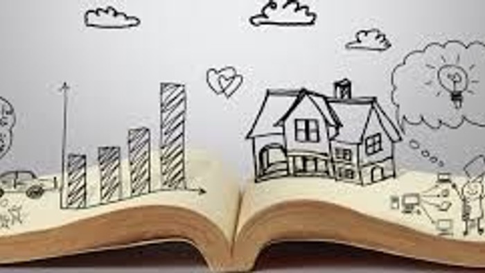 Bog med tegninger af boliger, træer og familier