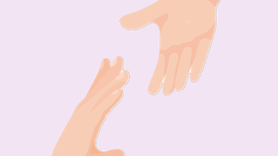 To hænder, der rækker ud mod hinanden i en gestus af forbindelse eller støtte.