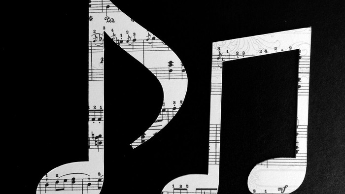 Das Bild zeigt zwei drei Noten