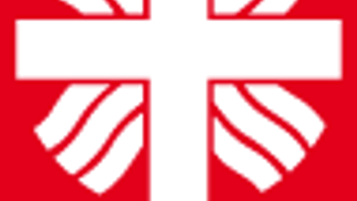 Das Bild zeigt ein rotes Logo mit einem weißen Kreuz und dem Wort