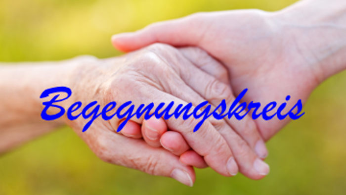 Zwei Hände halten sich gegenseitig, darüber steht 