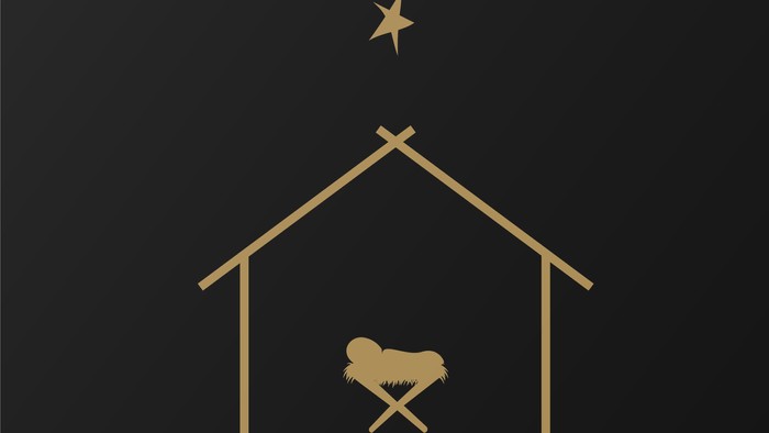 Goldene Weihnachtskrippe mit einem Stern darüber auf schwarzem Hintergrund