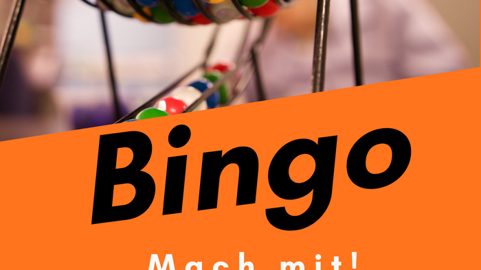 Oben Bingokugeln in einer Drehvorrichtung. Unten steht Bingo - mach mit!