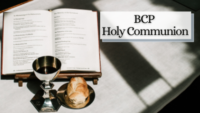 Open book, chalice, and bread on table, BCP Holy Communion