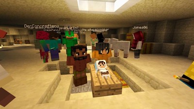 Ein Minecraft-Zimmer mit mehreren Spielern und farbigen Blöcken.