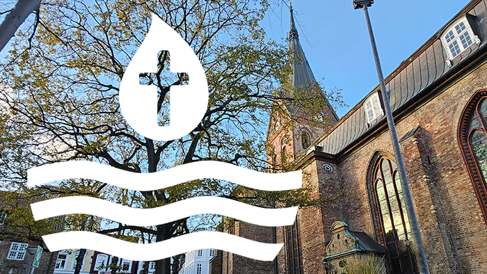 Kirche St. Marien im Vordergrund Taufsymbol