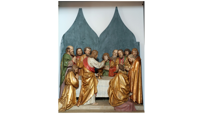 Das Bild zeigt eine religiöse Szene mit mehreren Personen in historischen Gewändern.