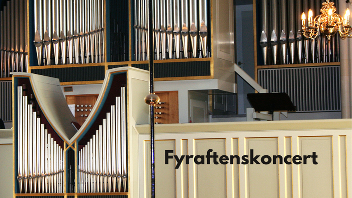 Organ på koncertscene med lys og noter.