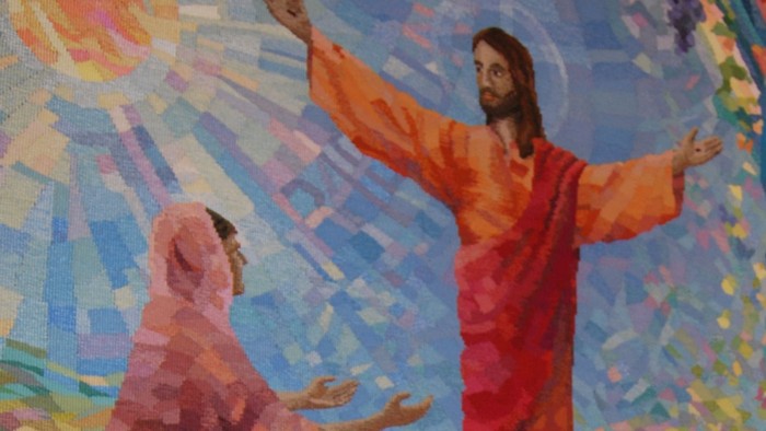 Stor maleri med Jesus og en anden person.