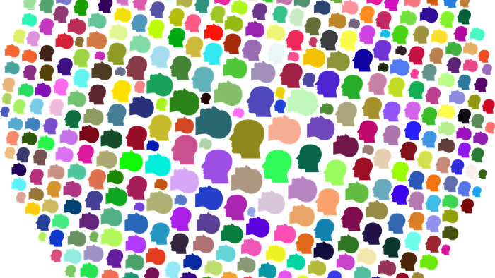 Bunte Punkte formen ein Sprechblasen-Symbol