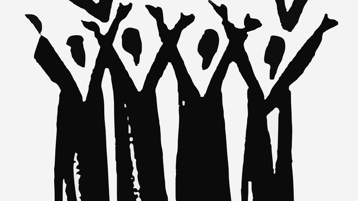 Eine Gruppe von Menschen feiert und jubelt mit erhobenen Armen.