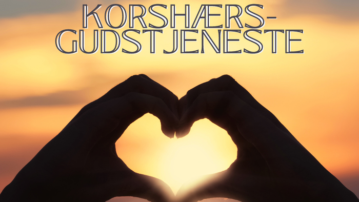 Hænder skaber hjerteform mod solopgang med teksten 