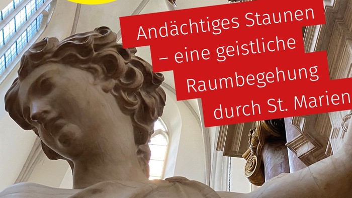 Bild zeigt eine Statue und eine Kirche mit Text in Deutsch